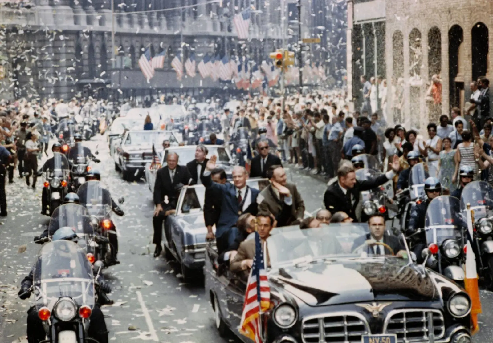 New York showers the Apollo 11 astronauts with ticker tape in the largest parade in the city's history, 13 August 1969