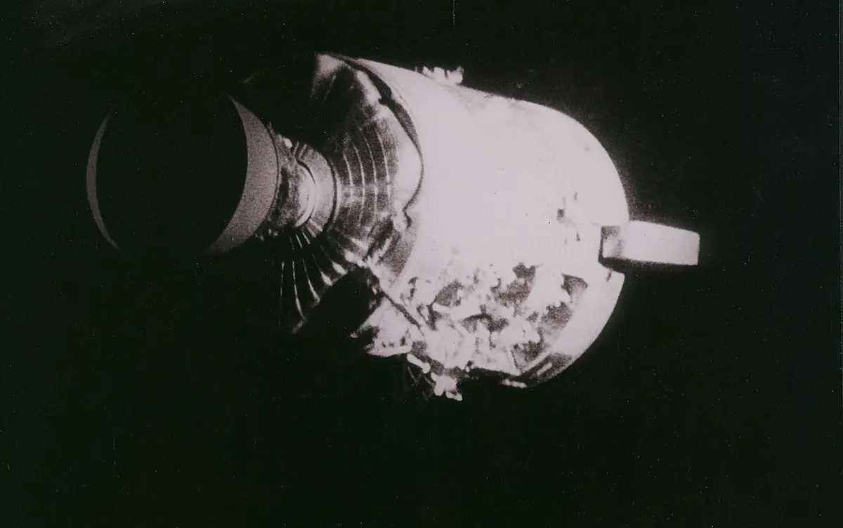 The service module after jettison, with one whole side blown out by the oxygen tank explosion, 17 April 1970