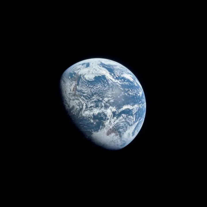 The Earth from Apollo 8, with the line between day and night crossing the Americas (AS08-16-2596)