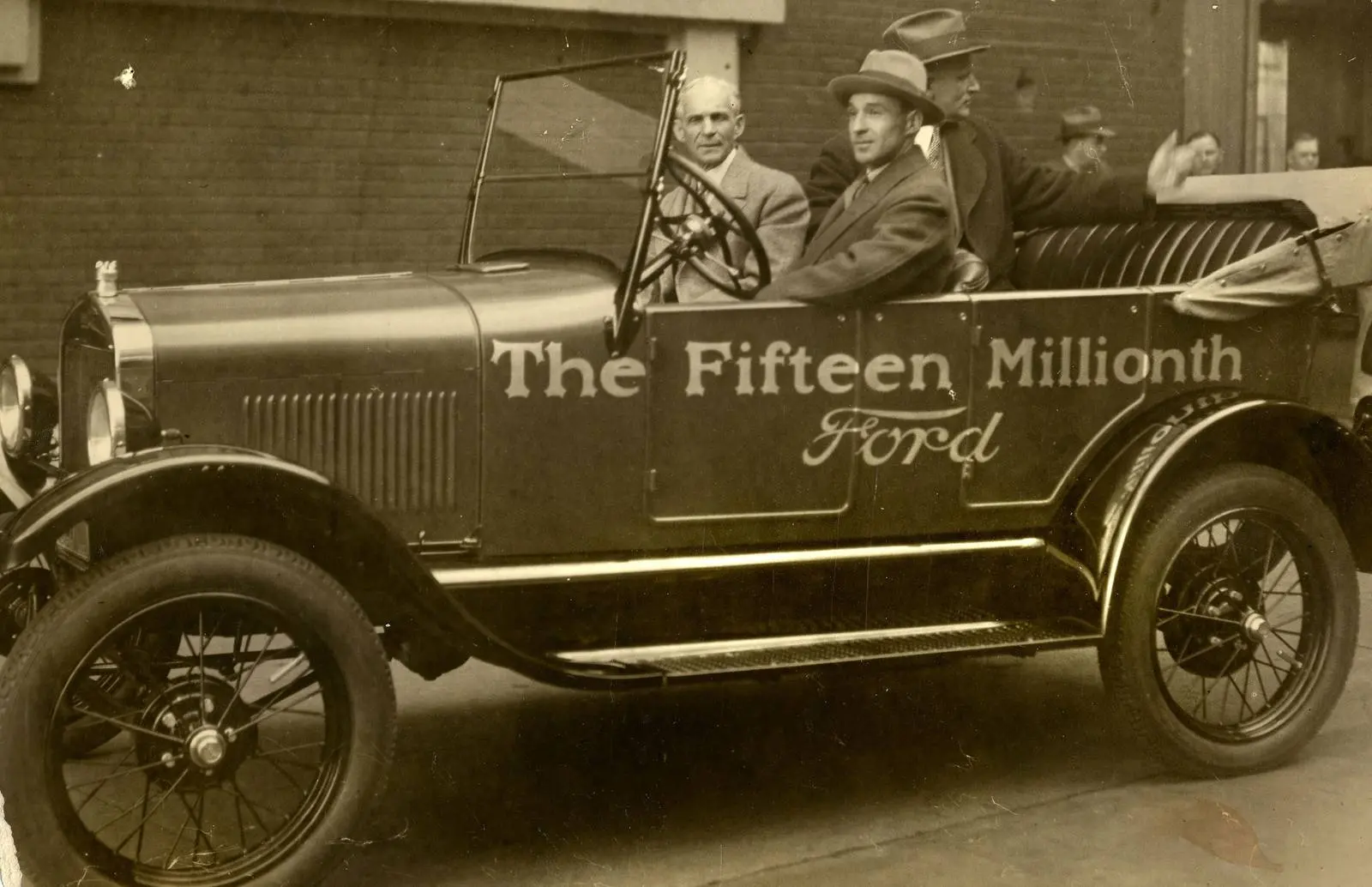 Henry Ford at the wheel of the fifteen millionth Model T, with Edsel Ford beside him, 26 May 1927.