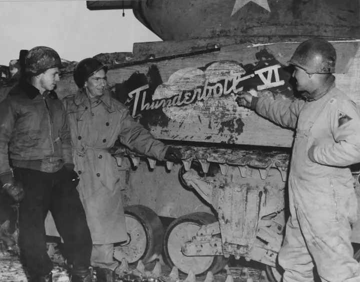 Lt. Col. Creighton Abrams, right, beside his Sherman Thunderbolt VI, named in tribute to the P-47 Thunderbolt fighter-bombers
