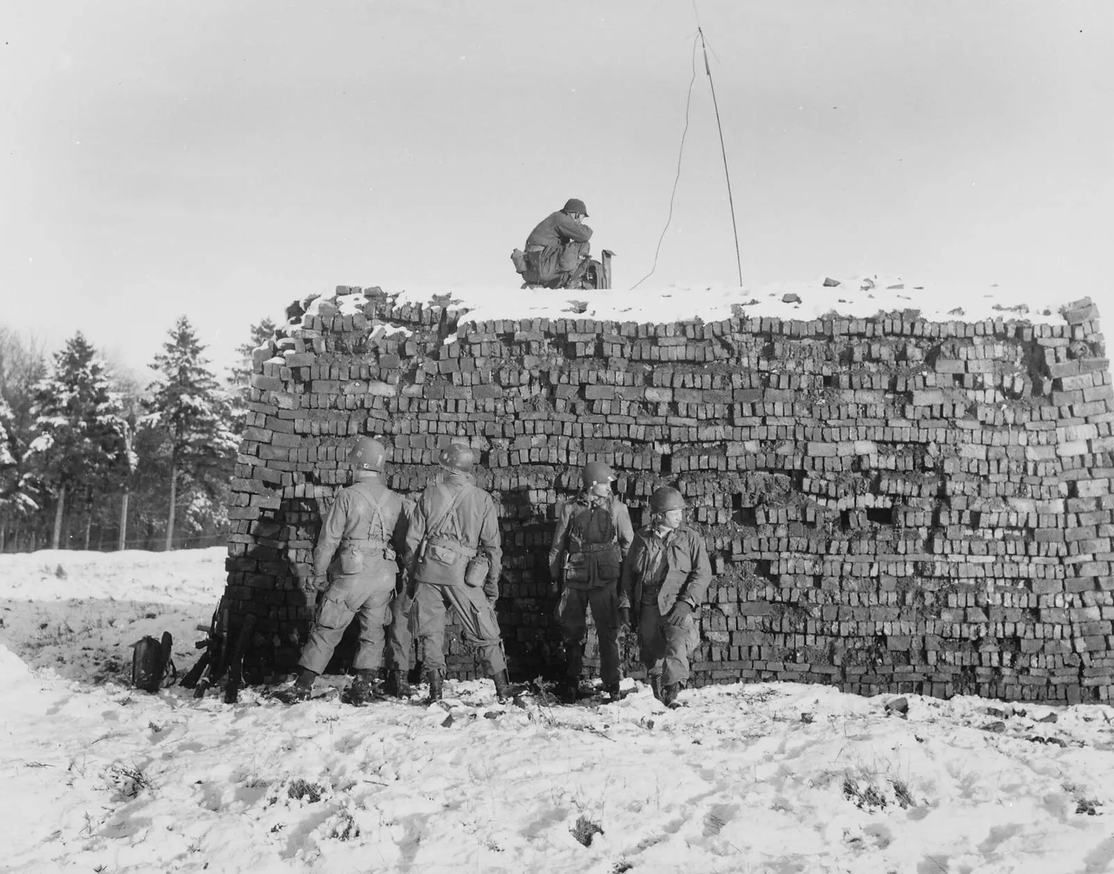 Pathfinders of the 101st, dropped in ahead of the cargo planes, set up a radar beacon near Bastogne, 23 December 1944