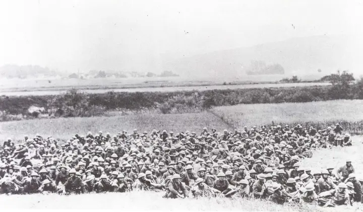 The fighting done, the 6th Marines gather outside Belleau Wood before moving on, June 1918