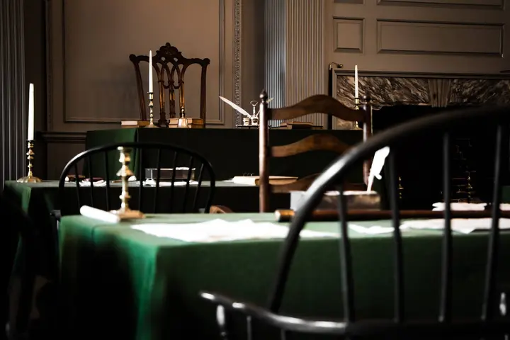 The Assembly Room of Independence Hall, with the President's chair on the dais where Washington presided.