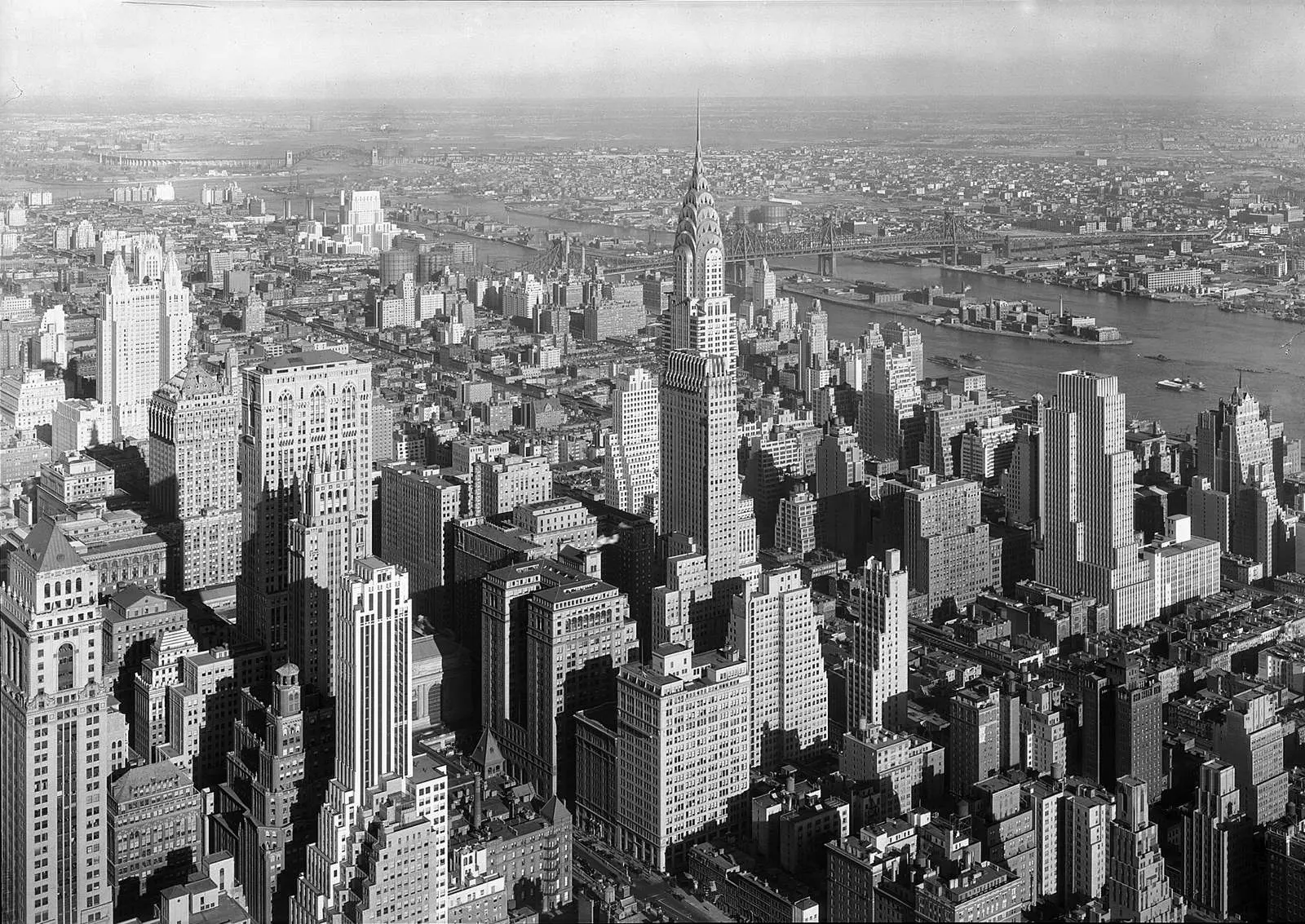 Midtown Manhattan from the Empire State Building in January 1932, looking toward the Chrysler Building and the East River.