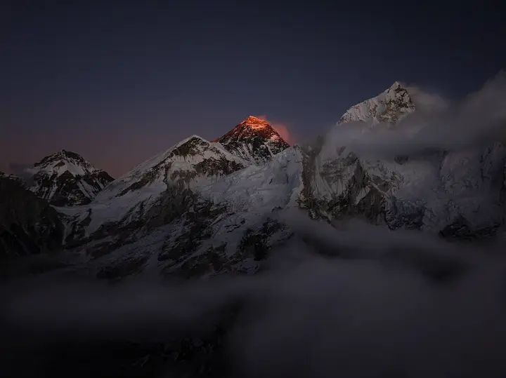 Sunset lights Everest’s summit, the hour Hornbein and Unsoeld stood on top on 22 May 1963.