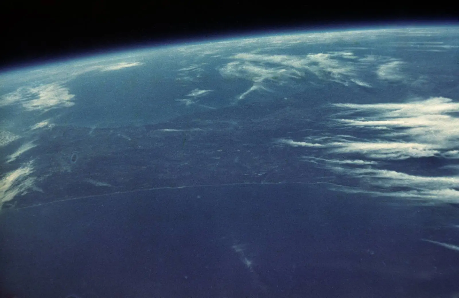 The Earth from orbit, photographed by John Glenn from Friendship 7, 20 February 1962 (S62-06009)