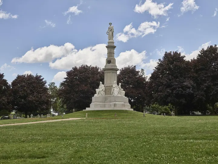 The Soldiers' National Monument, dedicated in 1869, stands at the center of the cemetery Lincoln dedicated.