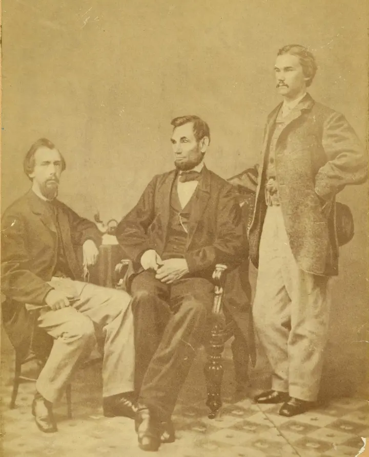 Lincoln with his secretaries John Nicolay, seated, and John Hay, photographed by Alexander Gardner in Washington on 8 November 1863, eleven days before Gettysburg.