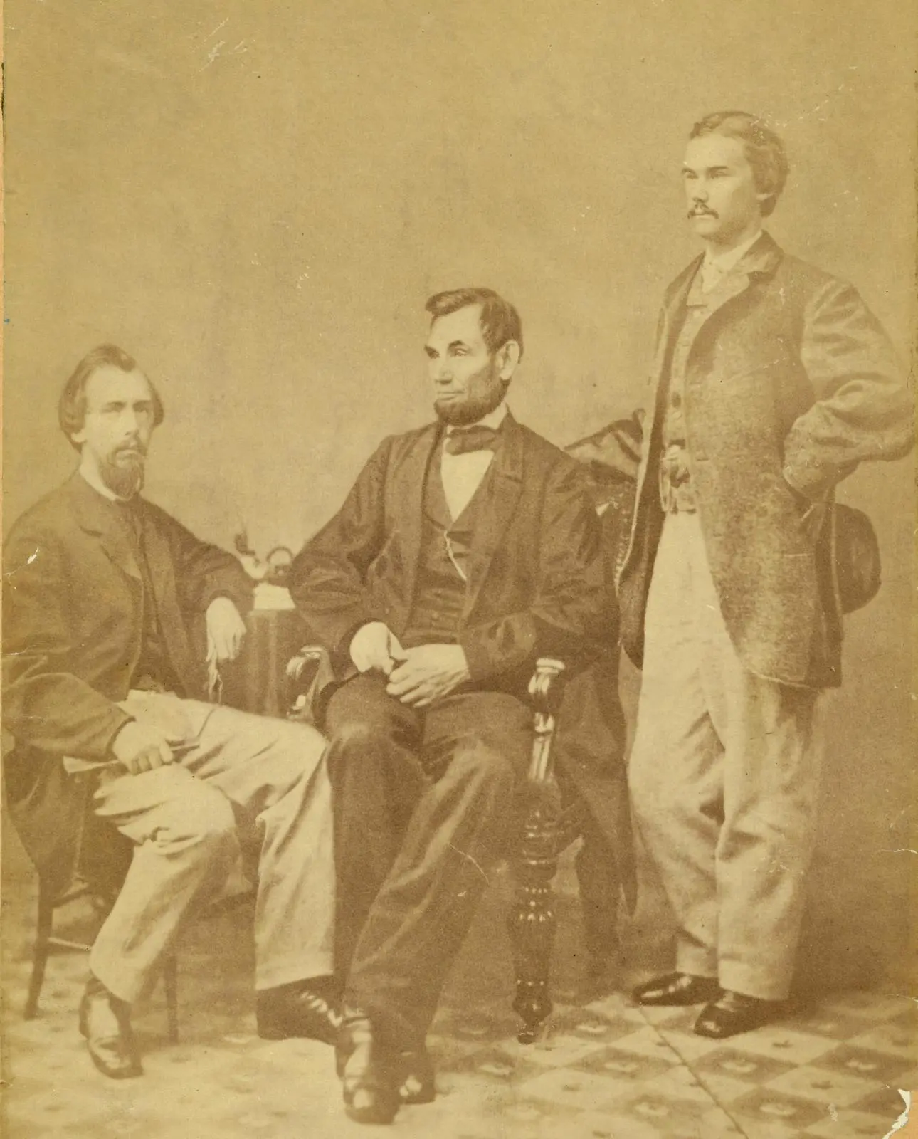 Lincoln with his secretaries John Nicolay, seated, and John Hay, photographed by Alexander Gardner in Washington on 8 November 1863, eleven days before Gettysburg.