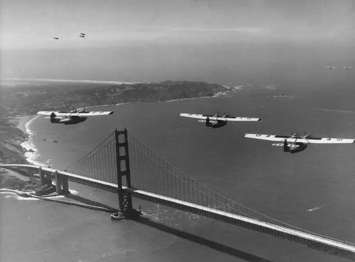 Navy PBY-1 Catalina flying boats of Patrol Squadron 9 over the new bridge, May 1937.