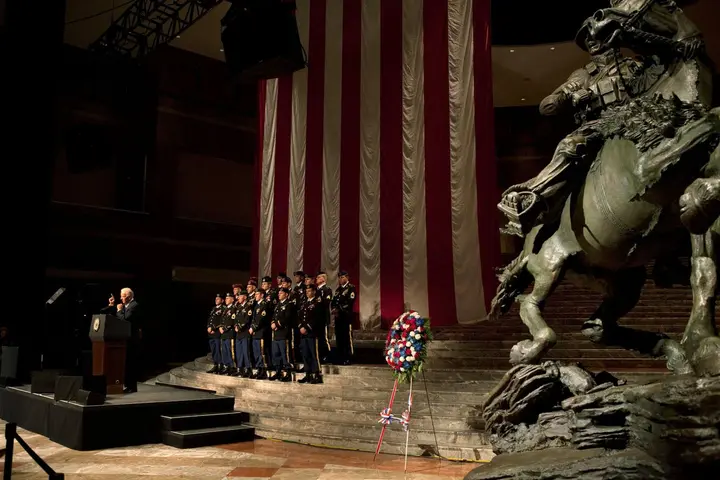 Vice President Joe Biden speaks at the unveiling of the Horse Soldier statue, De Oppresso Liber, in New York on Veterans Day, 11 November 2011