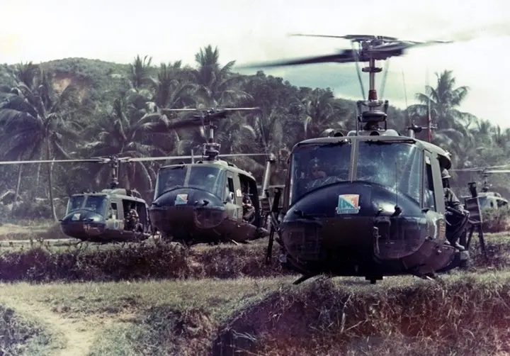 Bruce Crandall leads a formation of Company A, 229th Assault Helicopter Battalion Hueys before takeoff in Vietnam, about 1966.