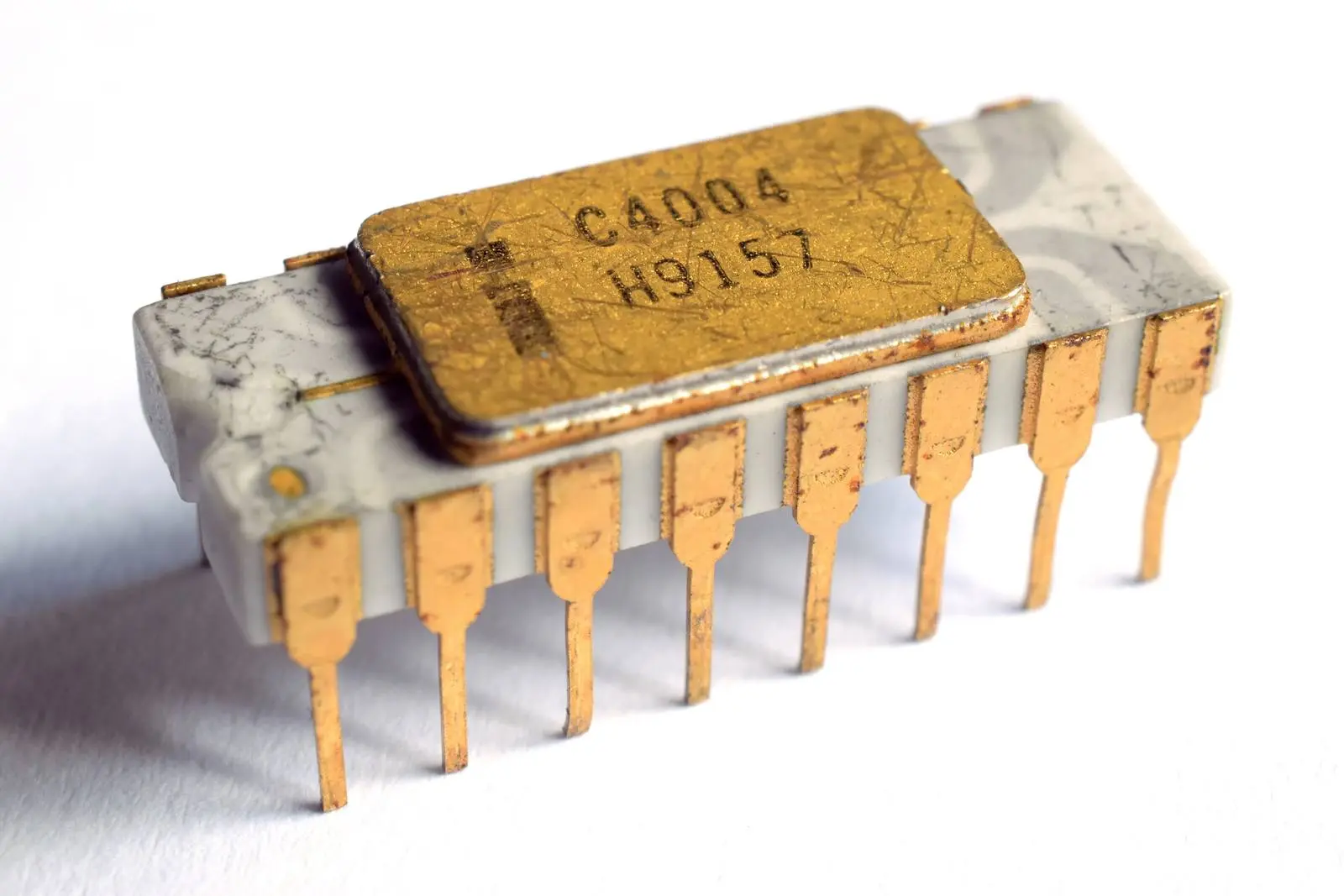 An Intel C4004, the first microprocessor, announced in November 1971 with 2,300 transistors on one chip