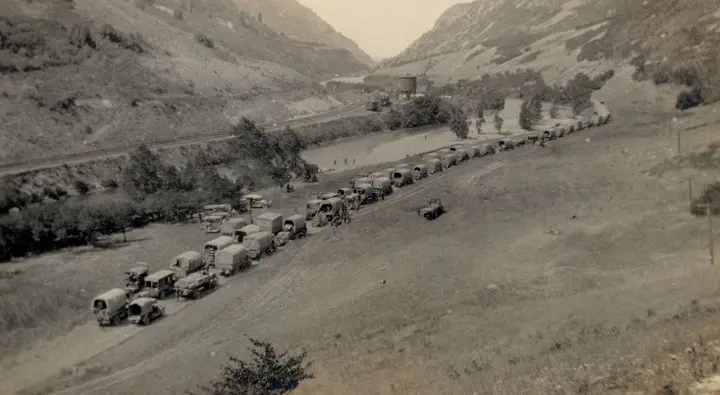 "The whole convoy, Utah": the 1919 Army transcontinental convoy lined up along a valley road, from the Eisenhowers' photo album.