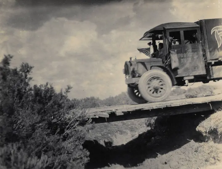 "Hoping it will hold": a convoy truck creeps across a plank bridge in 1919. The convoy broke or damaged 88 bridges and culverts on the way west.