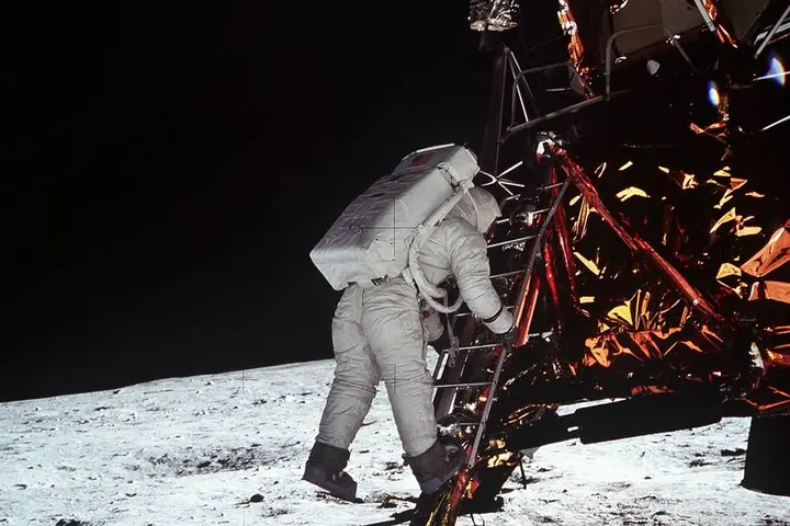 Buzz Aldrin descends Eagle's ladder to the lunar surface, July 20, 1969 (AS11-40-5868)
