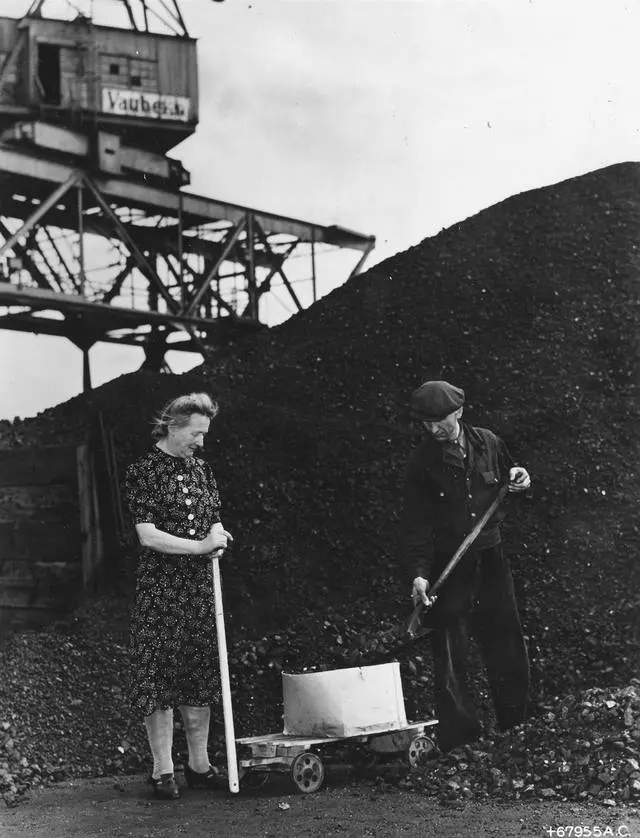 West Berliners collect their weekly coal ration during the airlift.