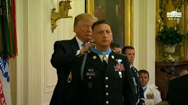 President Trump places the Medal of Honor on David Bellavia at the White House, 25 June 2019.