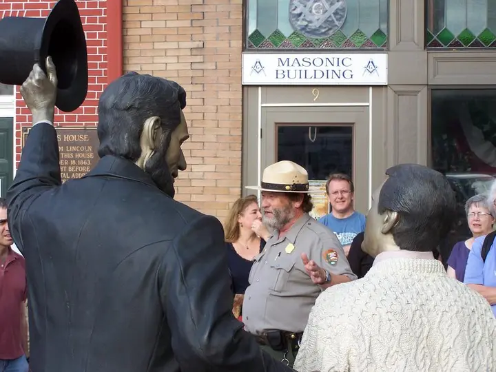 The David Wills House on the town square in Gettysburg, where Lincoln finished the Address, with a statue of Lincoln outside.