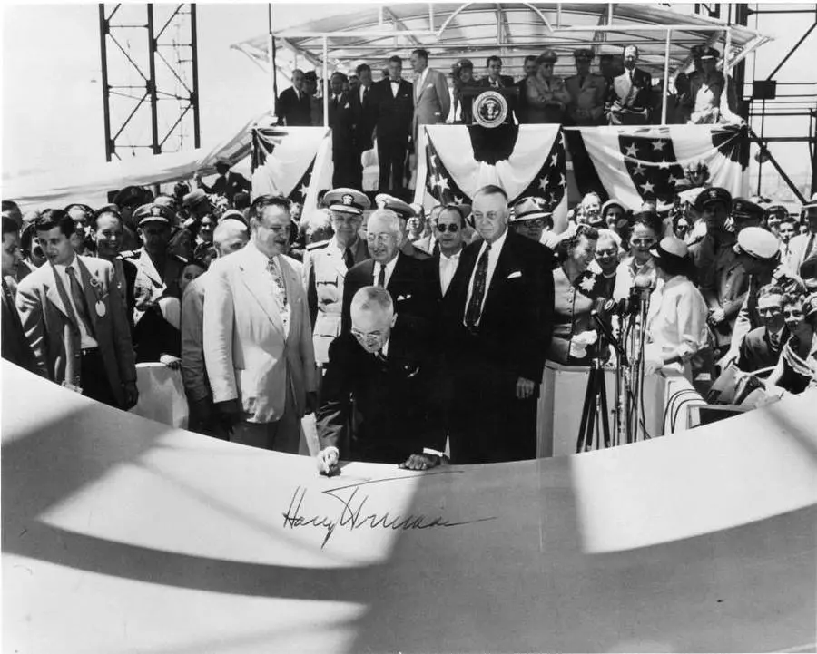 President Harry S. Truman authenticates the keel of Nautilus at Electric Boat, Groton, on 14 June 1952.