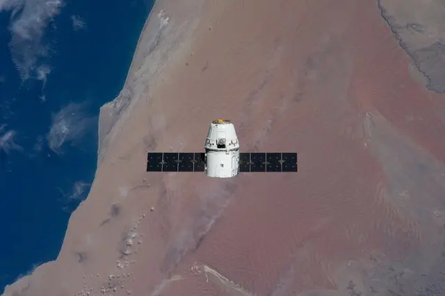SpaceX’s Dragon approaches the International Space Station over the Namib Desert, 25 May 2012 (ISS031-E-070943).