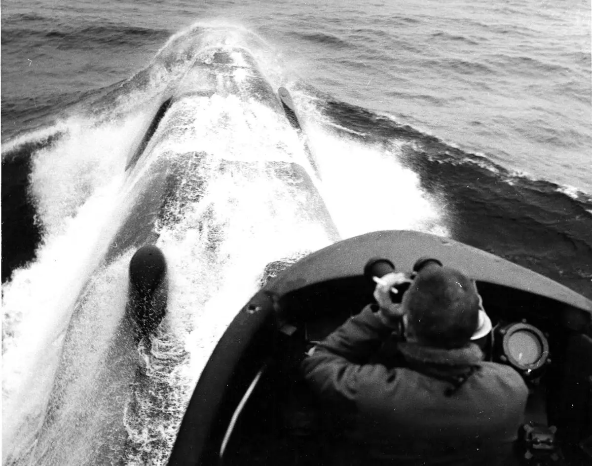 Nautilus plunges through the Chukchi Sea as the officer of the deck studies the edge of the polar ice she must pass under.