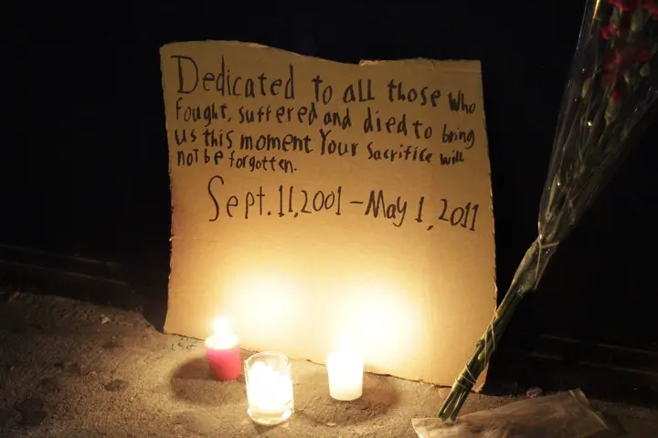 A handmade memorial left at Ground Zero the night the news broke: “Sept. 11, 2001 – May 1, 2011”
