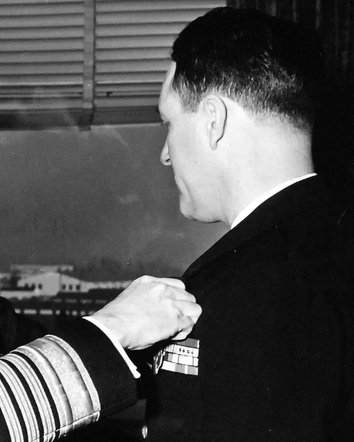 Lt. Eugene F. Clark receives the Navy Cross from Adm. Donald B. Duncan at the Pentagon, 1952 (crop of 330-PS-2537).
