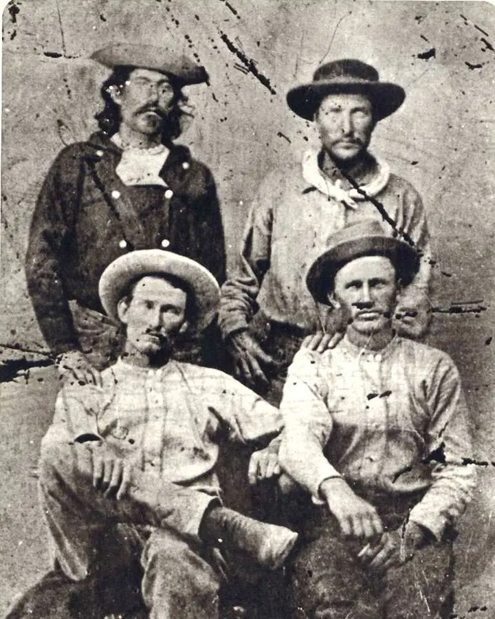 Riders of the Pony Express division out of St. Joseph in a tintype of about 1860: Johnny Fry and Billy Richardson standing, Charlie and Gus Cliff seated.
