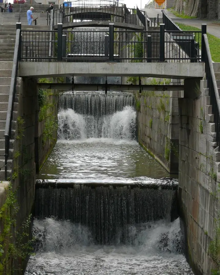 The surviving north flight of five locks at Lockport, rebuilt in the 1840s on the double-flight plan Nathan Roberts designed for the 1825 canal. No free portrait of Nathan Roberts is available.