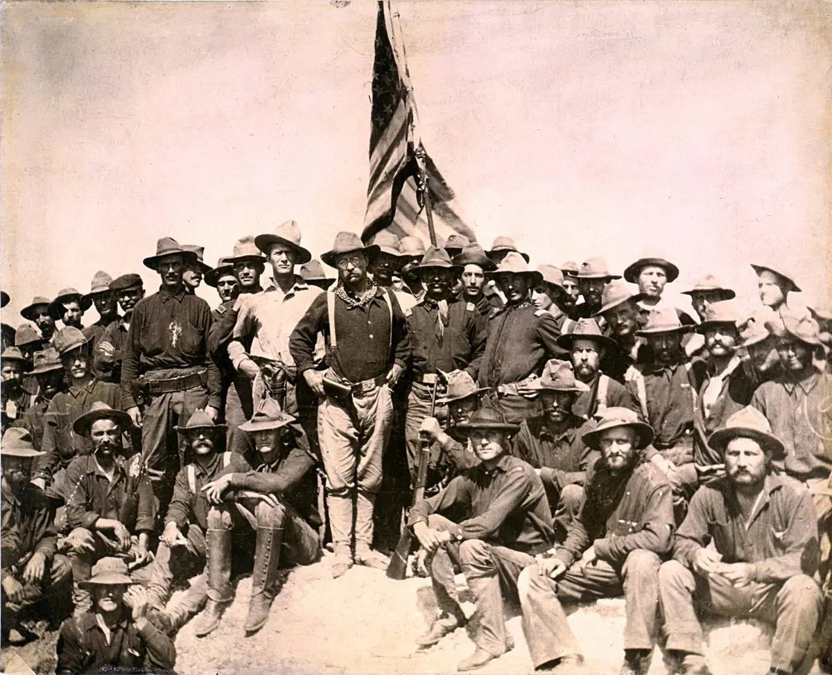 Colonel Roosevelt and his Rough Riders at the top of the hill they captured, Battle of San Juan, July 1898