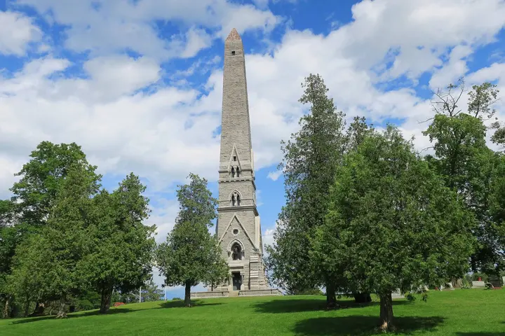 The Saratoga Monument, a 155-foot granite obelisk on the ground of Burgoyne’s last camp in Victory, New York. Its cornerstone was laid on the centennial of the surrender.