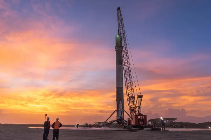 The first orbital booster ever to land stands upright on Landing Zone 1 after its return, December 2015.